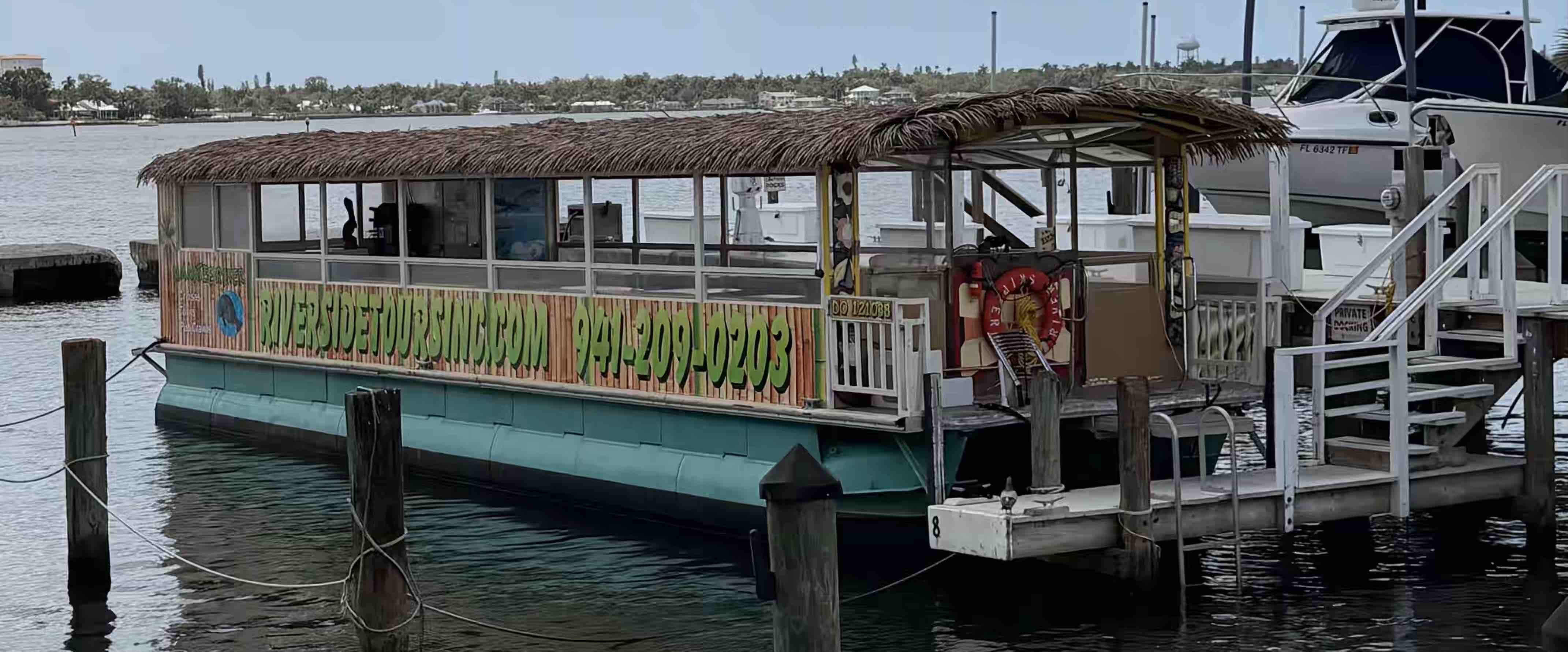 River Skipper II tiki boat on the Manatee River at sunset